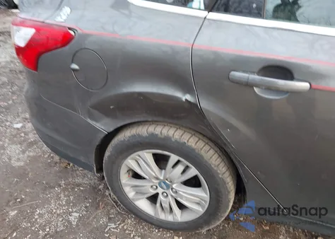 2012 Ford Focus Sel z USA, uszkodzony, nr VIN 1FAHP3H21CL333743